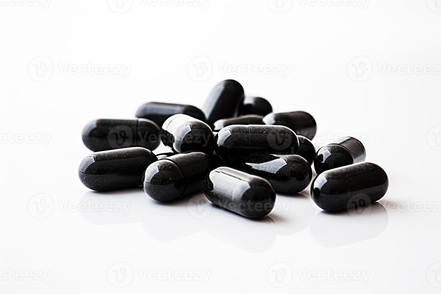 Pile of Black Pills on White Table photo