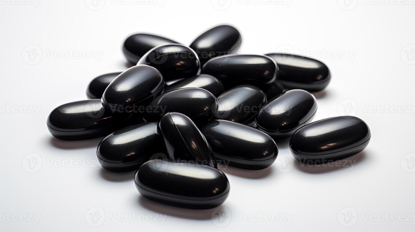 Stack of Black Pills on White Table photo