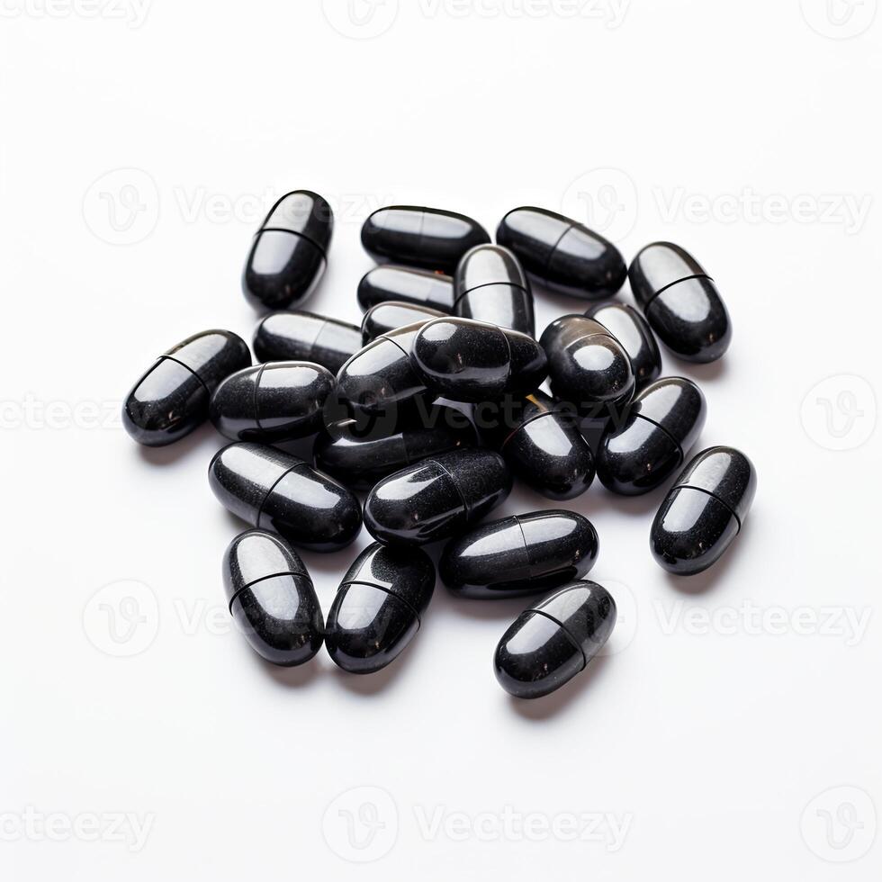 Heap of Black Pills on White Table photo