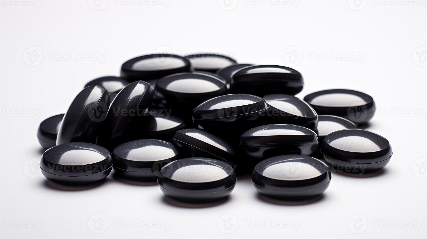Stack of Black and White Pills on White Surface photo
