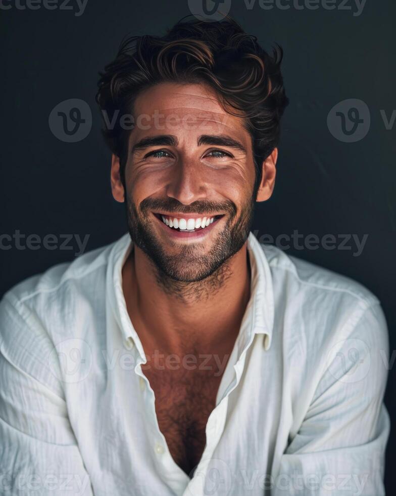 Smiling Man in White Shirt photo