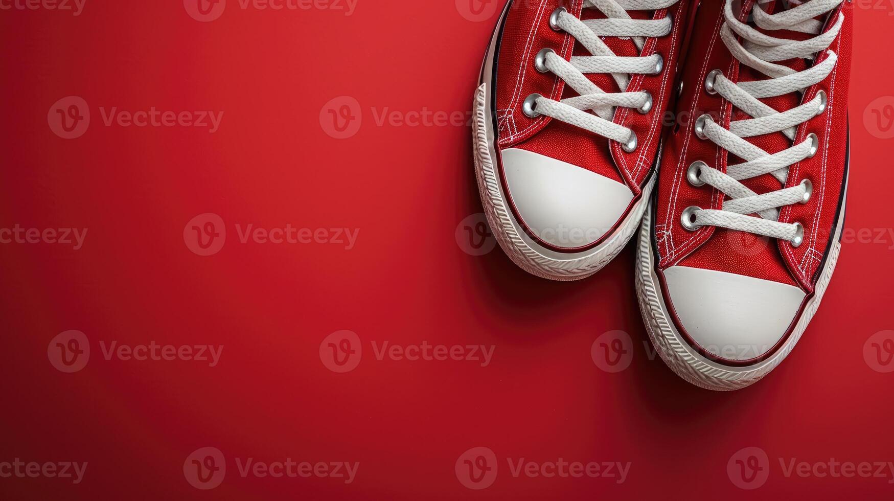 Red Sneakers on Red Background photo
