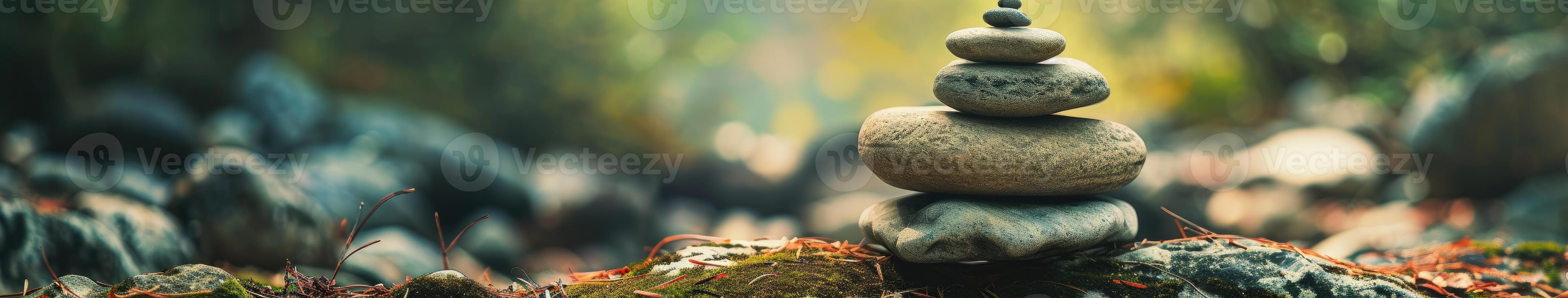 Stack of Rocks on Moss-Covered Ground photo