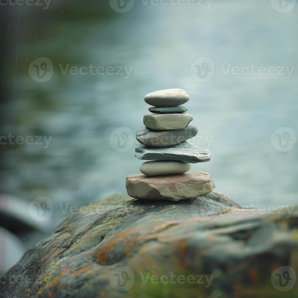 Stack of Rocks Balanced on Top of a Rock photo