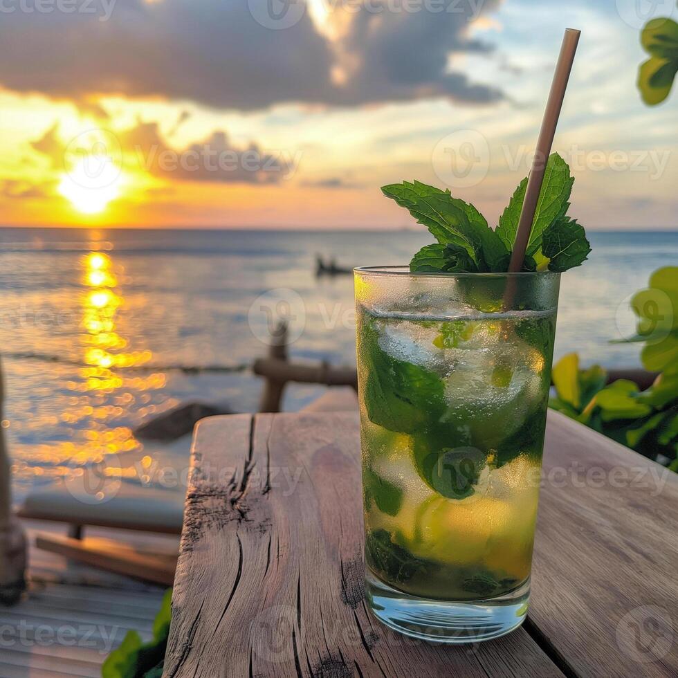 Multicolored bright cocktail with straw in a glass close up with ice cube and mint photo
