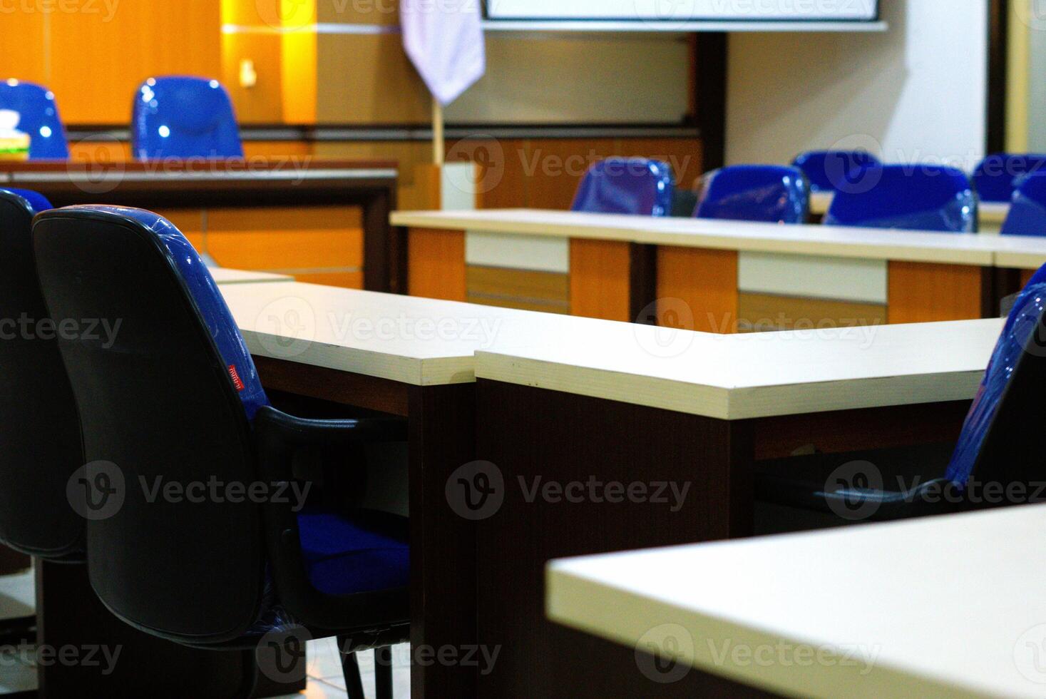 Empty seat and table in a meeting room photo
