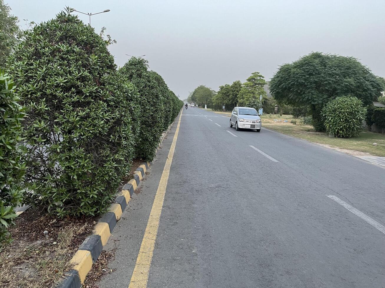 low angle view of city traffic in Lahore, Pakistan on June 3, 2024. photo