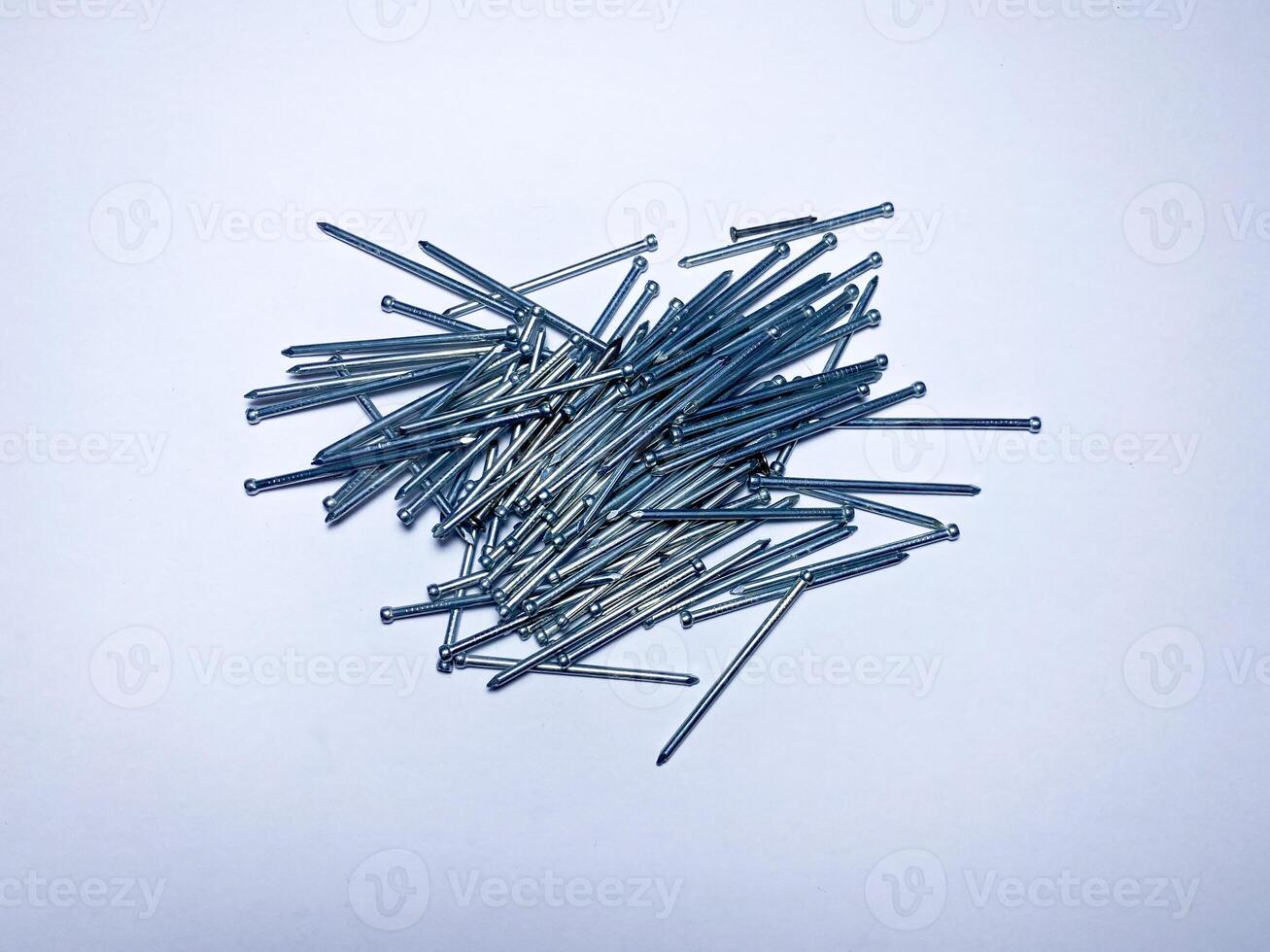 Finishing galvanized nails for high-quality fasteners of such materials as skirting boards, shtapik, parquet, platbands lining photo