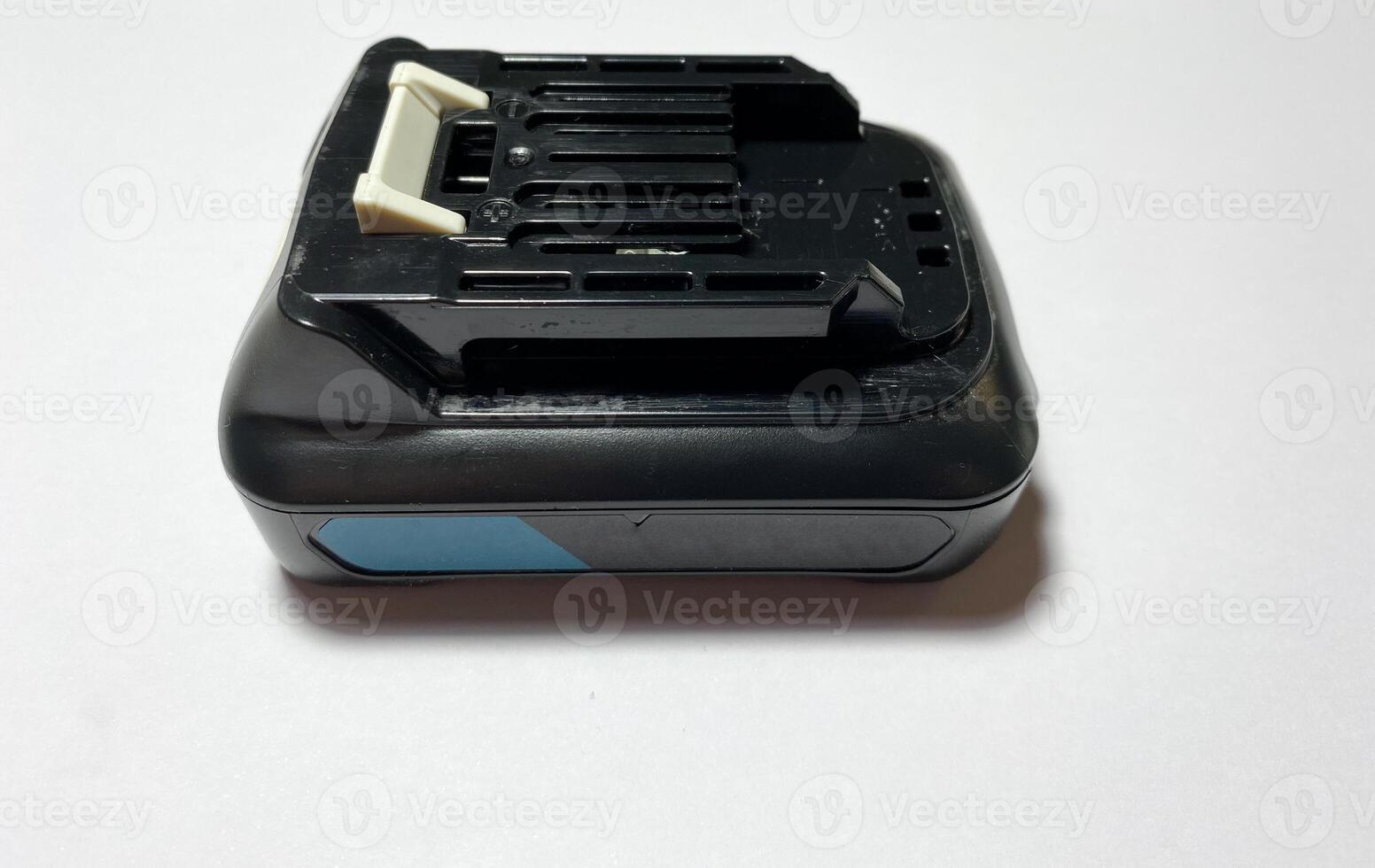 Charging battery for a screwdriver on a white isolated background photo