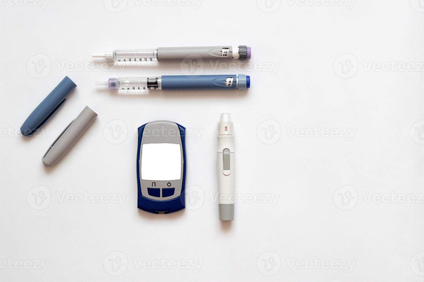 Insulin short, long, glucose meter, test strips and finger piercing pen on a white isolated background. Set for diabetics with mock up photo