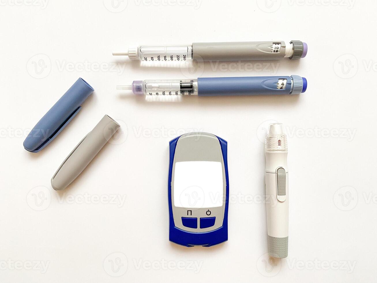 Insulin short, long, glucose meter, test strips and finger piercing pen on a white isolated background. Set for diabetics with mock up photo
