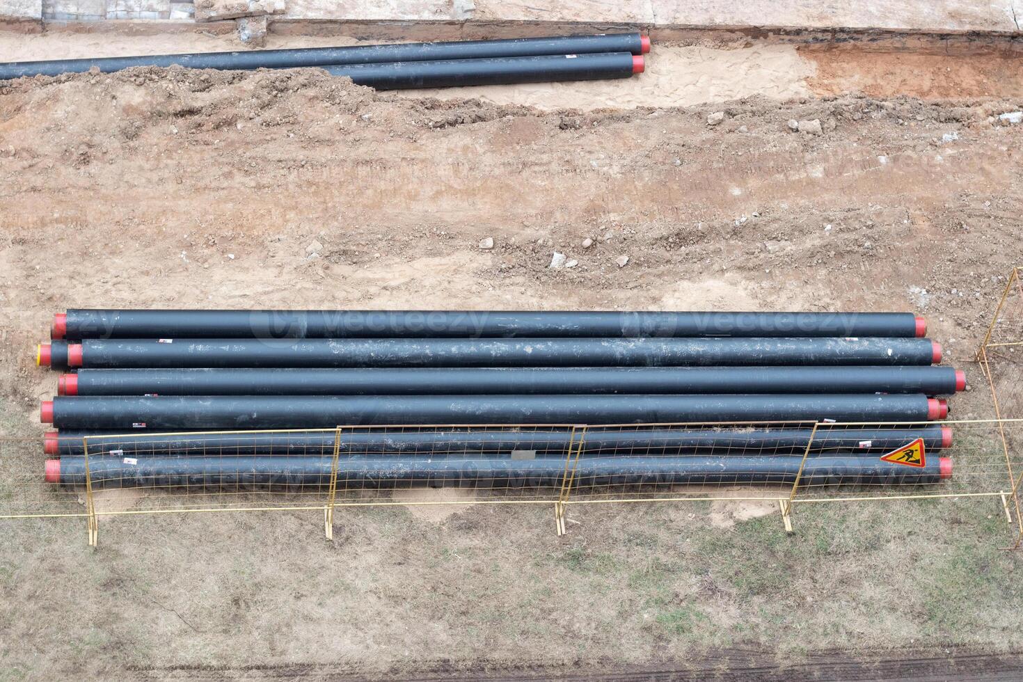 Construction works. Laying a pipeline to provide homes with hot and cold water. Replacing the old pipeline photo
