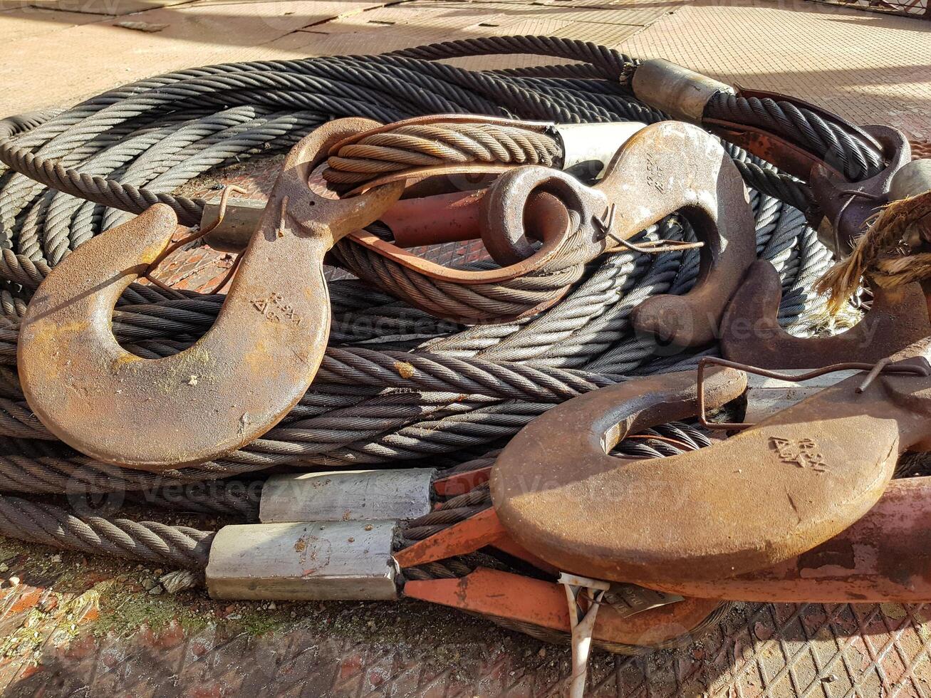 Chain hook of the tower crane for lifting cargo close-up. Rope slings close-up photo