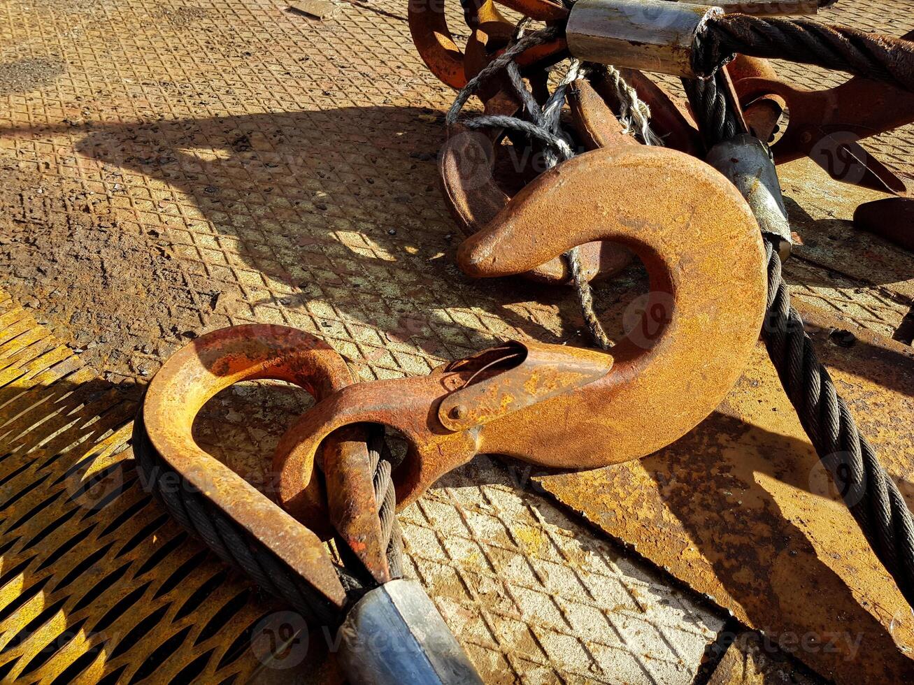 Chain hook of the tower crane for lifting cargo close-up. Rope slings close-up photo