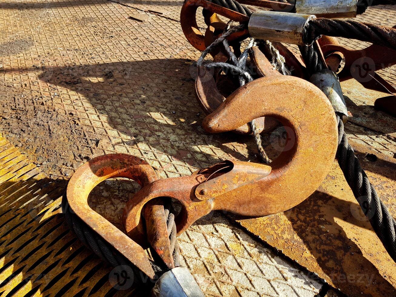 Chain hook of the tower crane for lifting cargo close-up. Rope slings close-up photo
