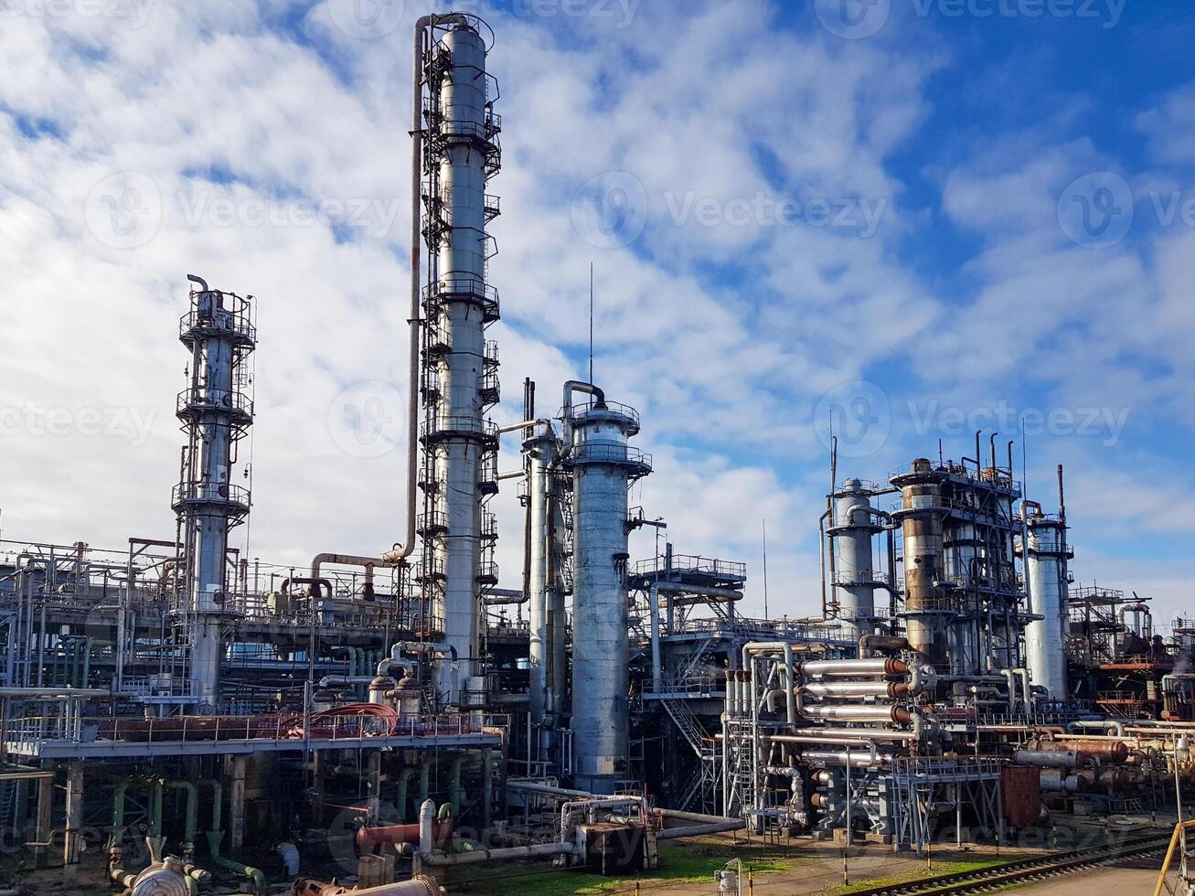 Shop for the production of methanol rectified petrochemical plant. Exterior of the raw methanol pre-rectification column and the main rectification column with copy space photo