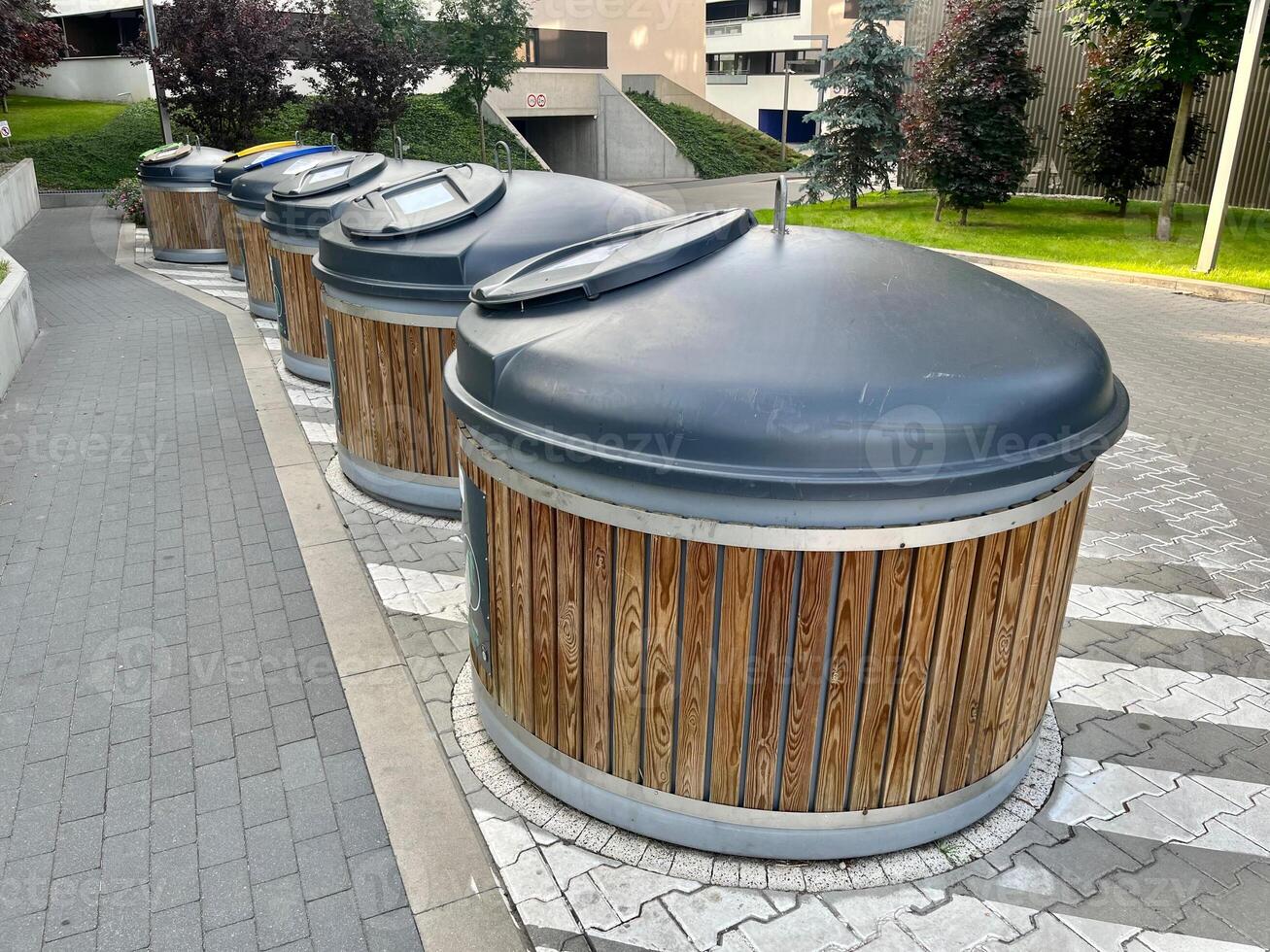 Underground containers for garbage and solid waste at the apartment complex photo