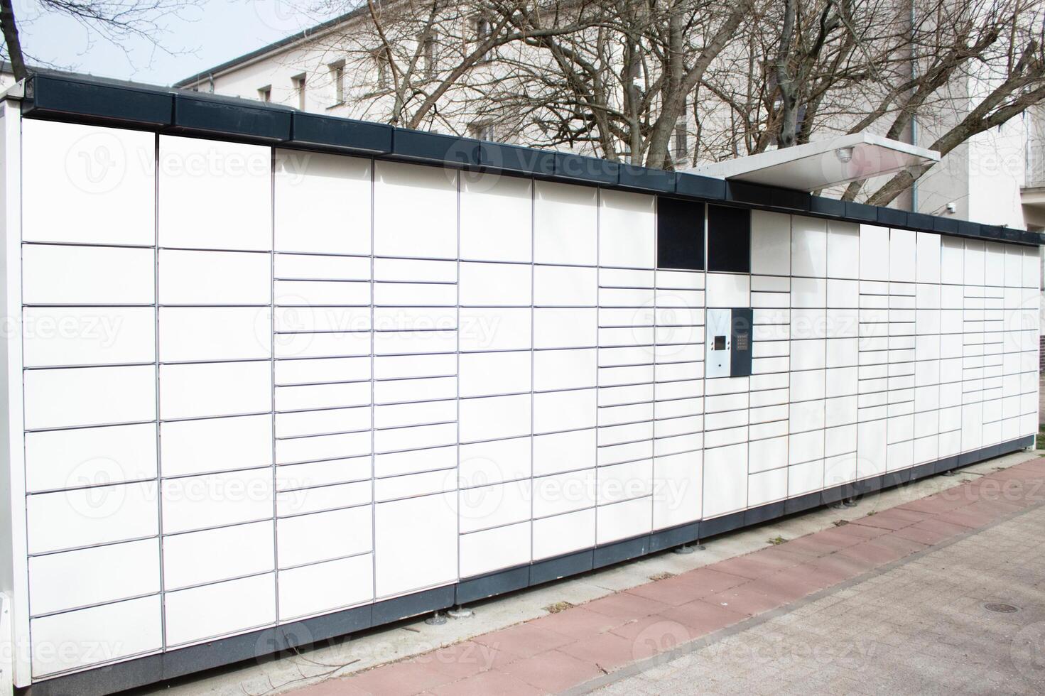 Automated self-service postal terminal. Automated postal terminal for storing parcels photo