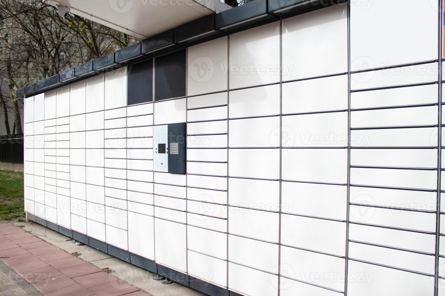 Automated self-service postal terminal. Automated postal terminal for storing parcels photo