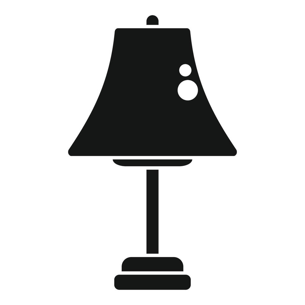 Black glyph icon of a bedside lamp standing on a night table vector