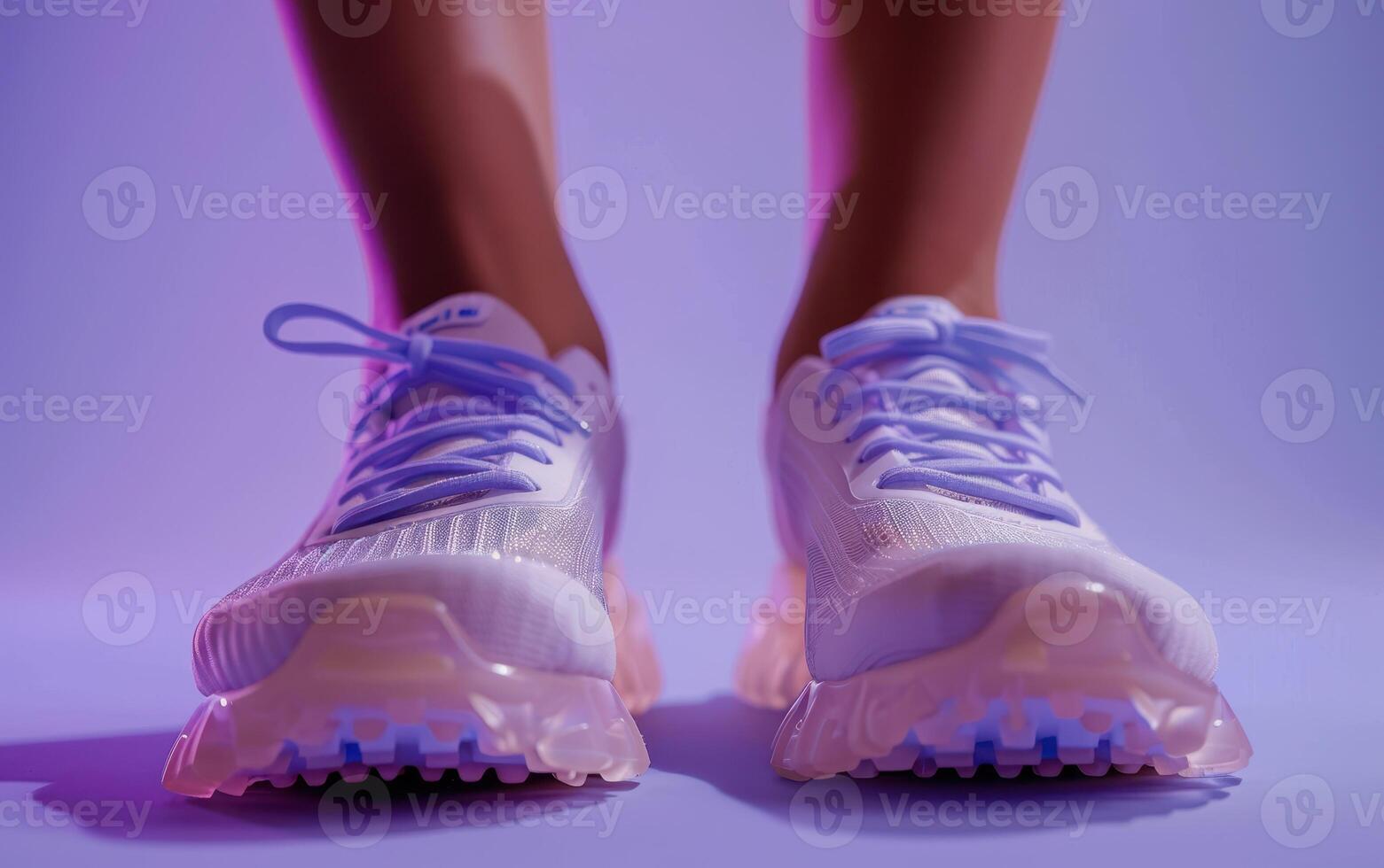 A Pair of White Sneakers With Lilac Laces Ready for a Run photo