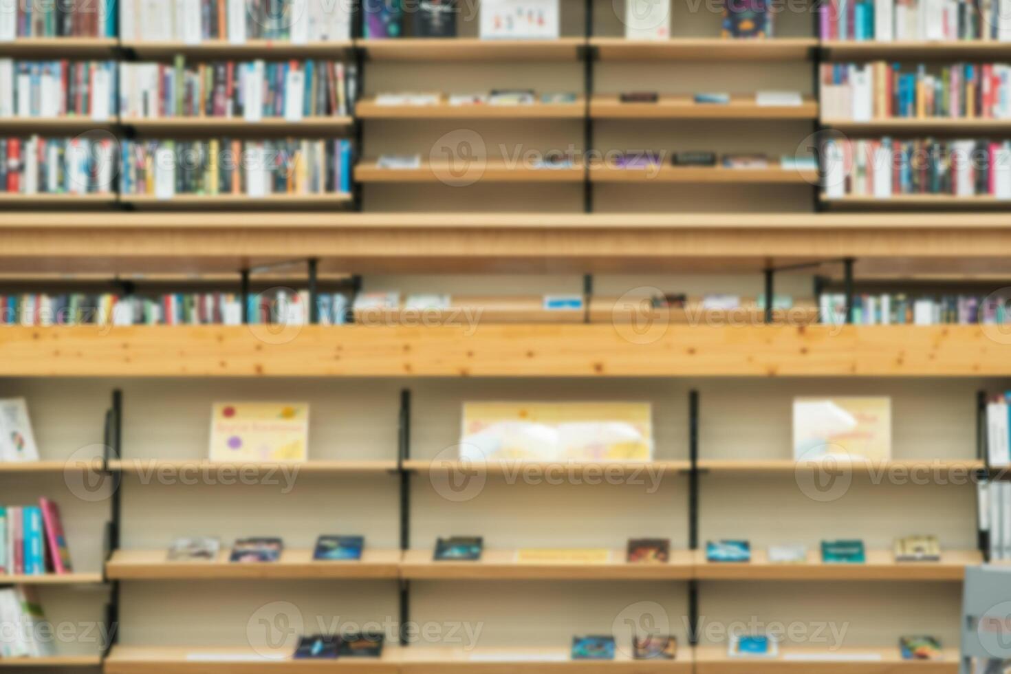 blurred background - bookshelves in the library photo