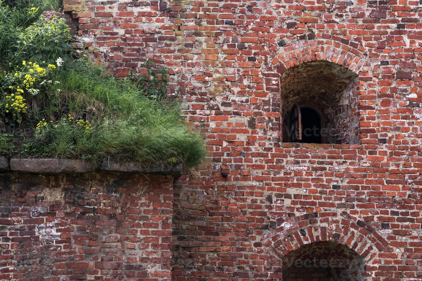 vintage architectural background, fragment of a brick wall of an old castle photo