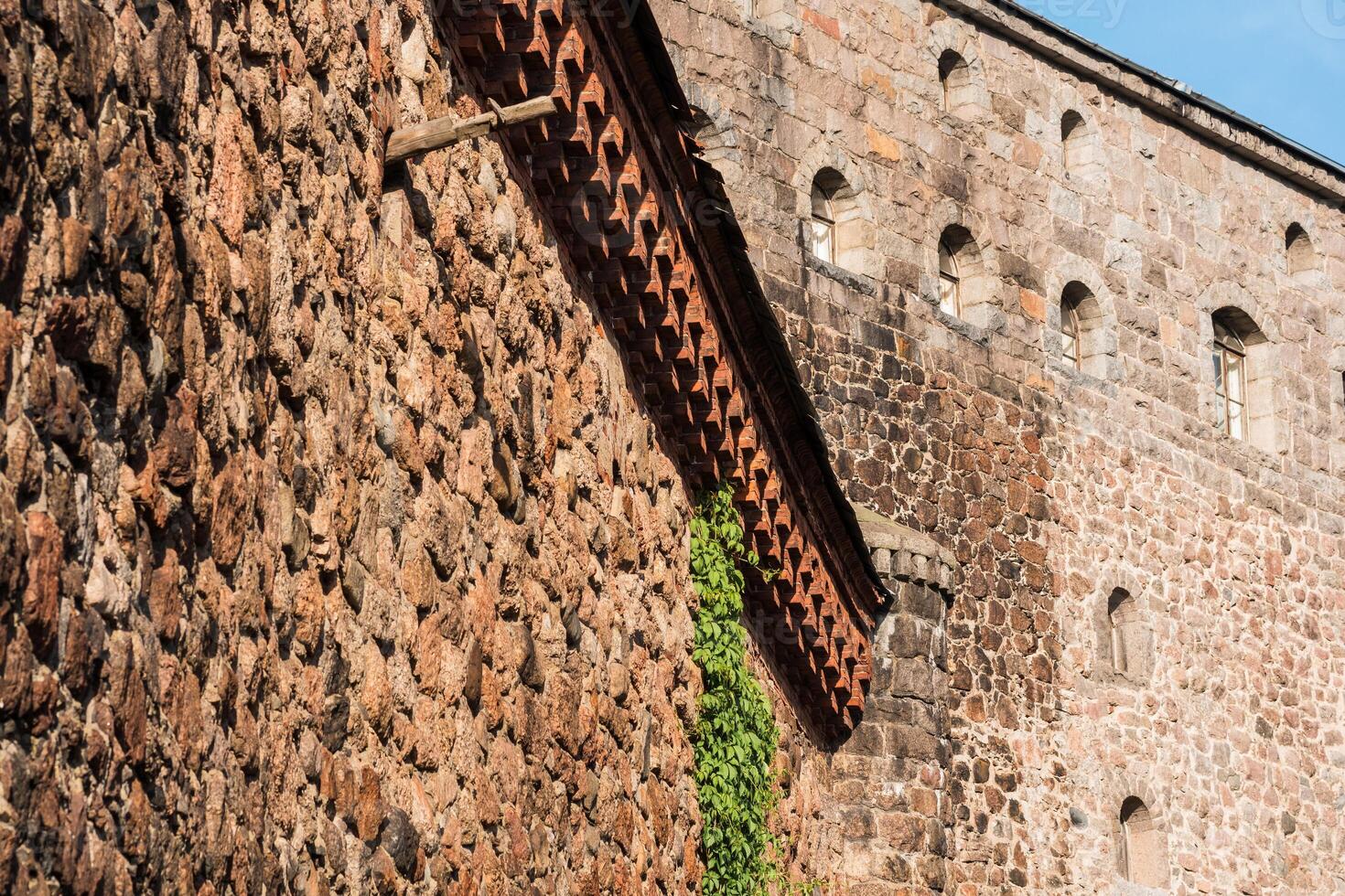 vintage architectural background, fragment of walls of an old castle photo