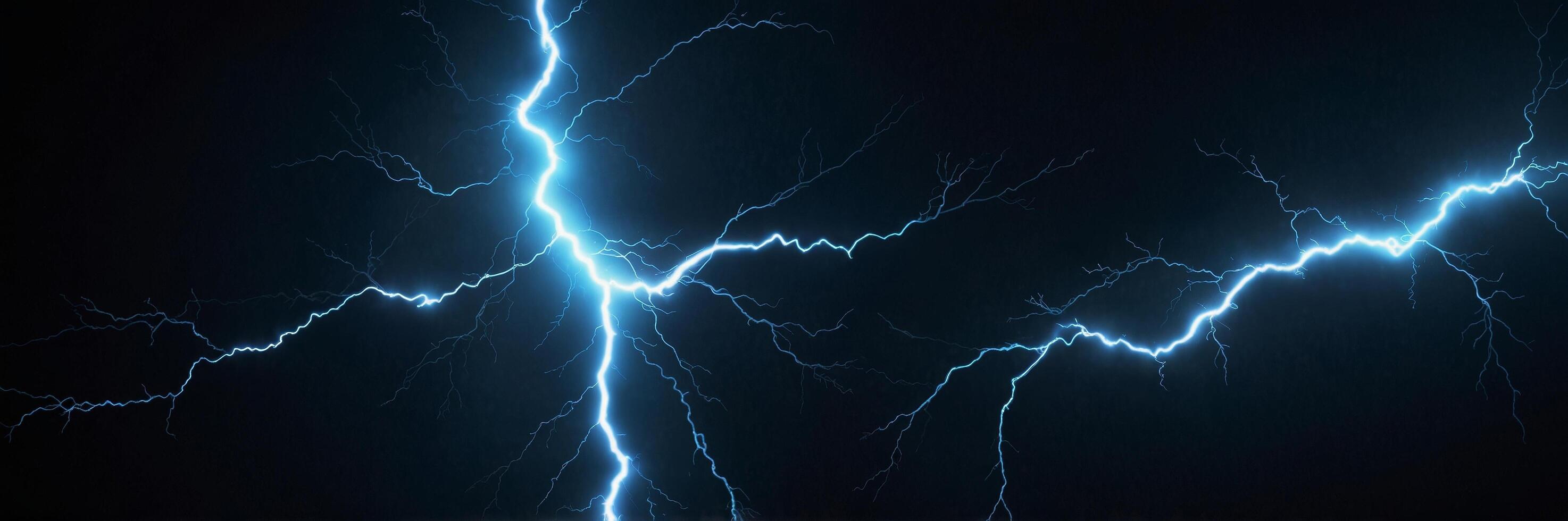 Dynamic Blue Lightning Bolt with Glowing Core and Jagged Tendrils photo