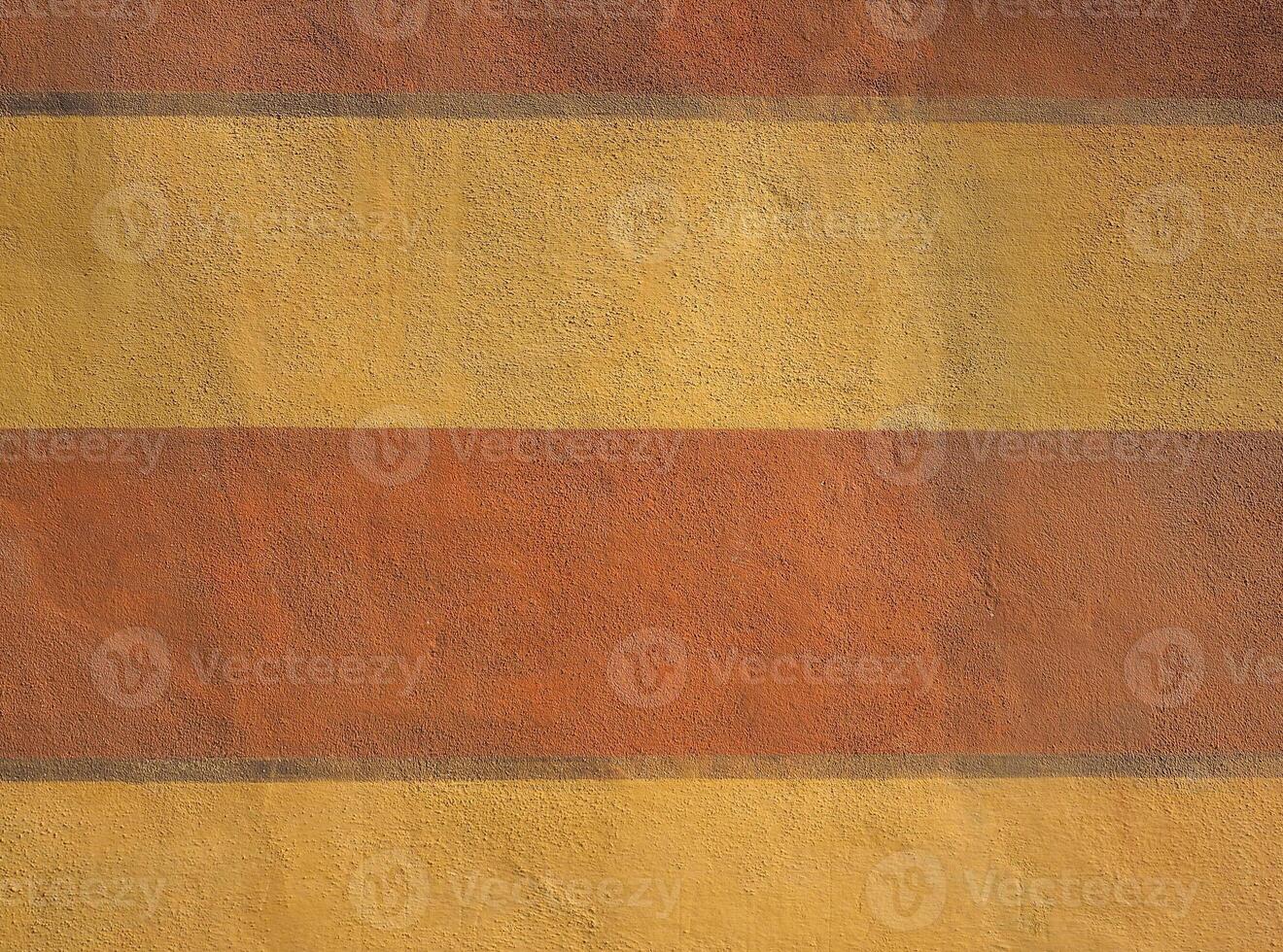 industrial style red and yellow plaster texture background photo