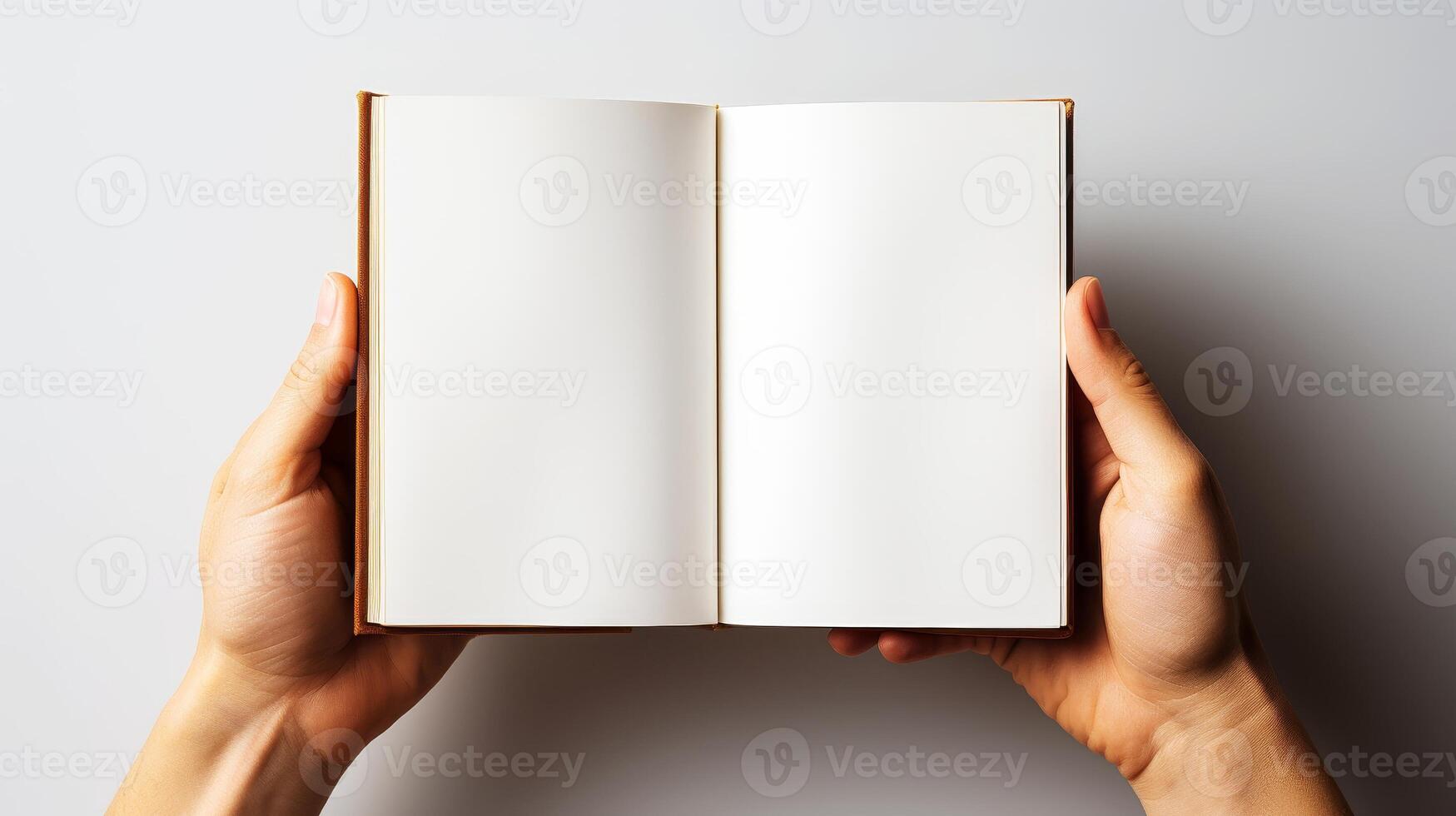 Blank page of the book in hands. photo