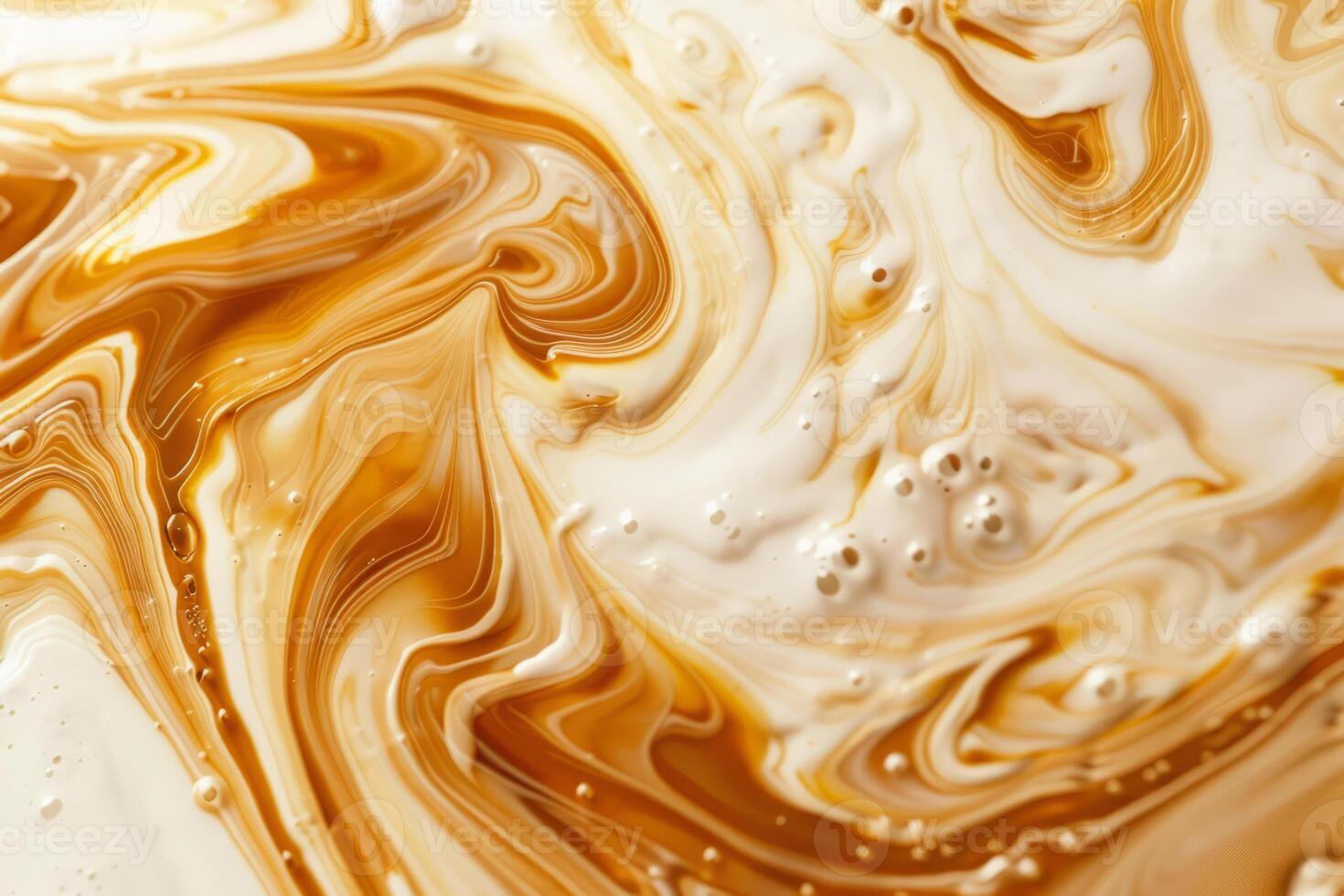 Swirls of coffee and cream blending together. Abstract pattern of warm tones photo