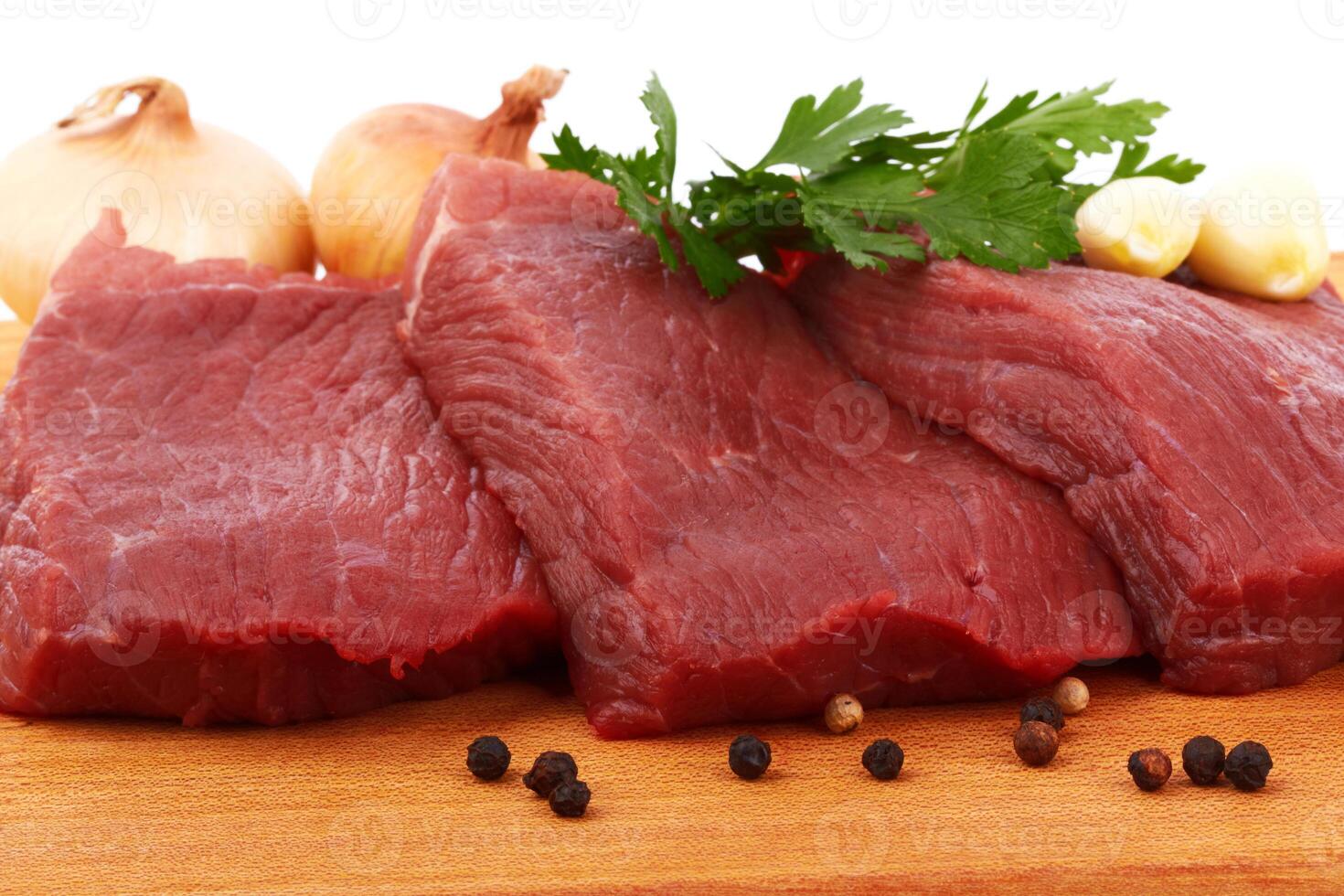 Raw beef on white photo