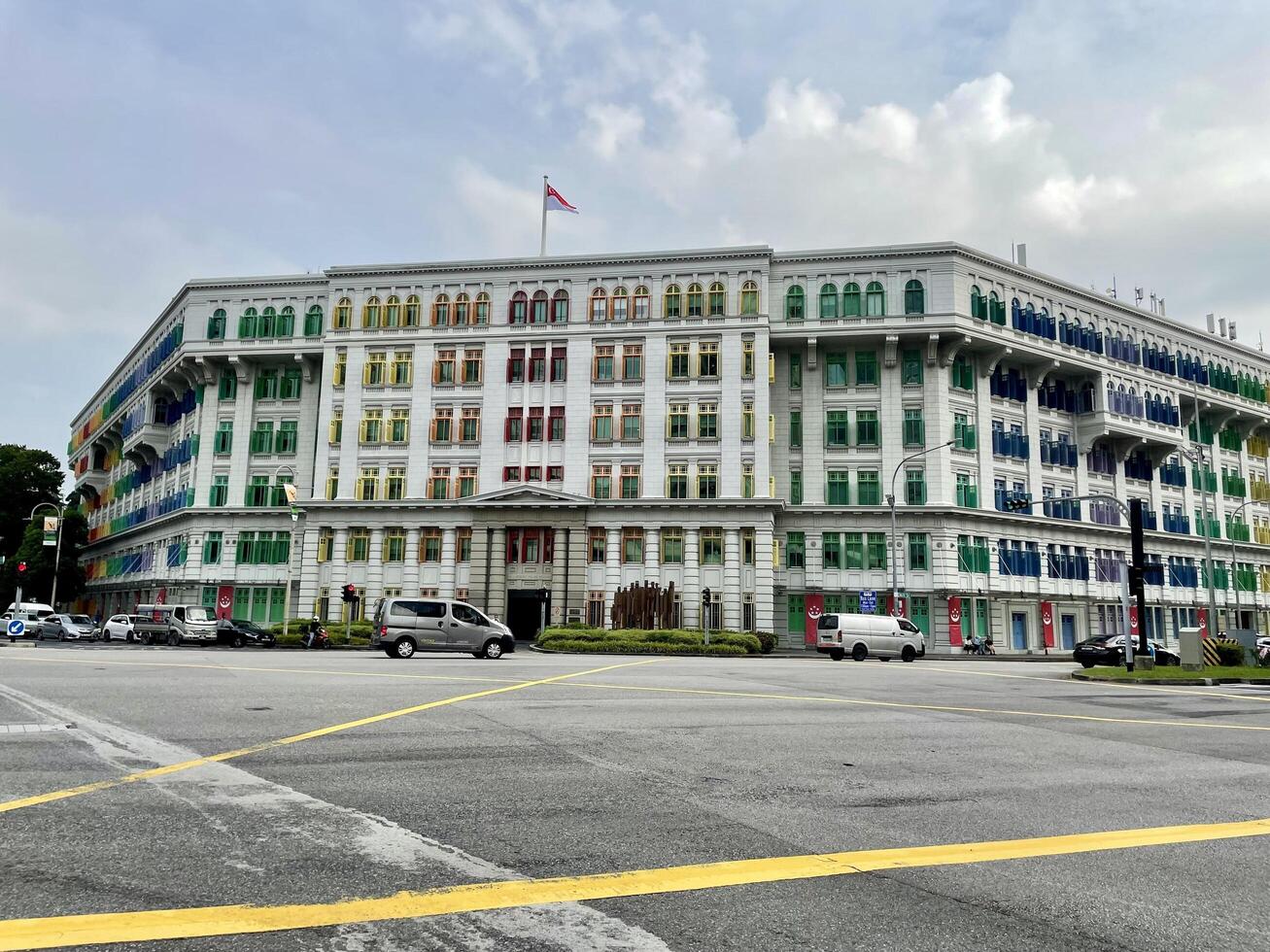 Singapore - July 10 2024 Main view of the Old Hill Street Police Station. The colorful building of the Ministry of Communications and Information and the Ministry of Culture, Community and Youth photo