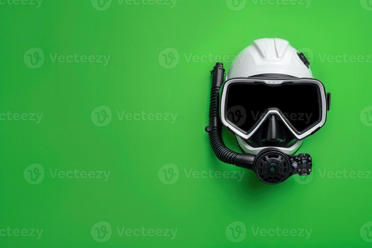 An isolated, high-tech diving helmet designed for underwater exploration rests against a vivid green backdrop, showcasing its advanced features and sleek design. photo