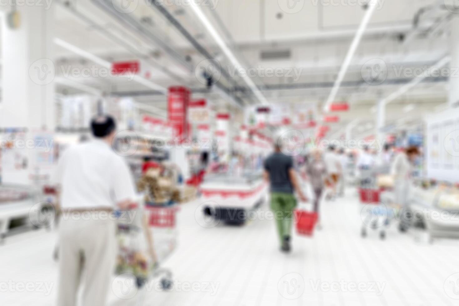 Interior supermarket products. Buyers on the trading floor. Soft focus background. photo