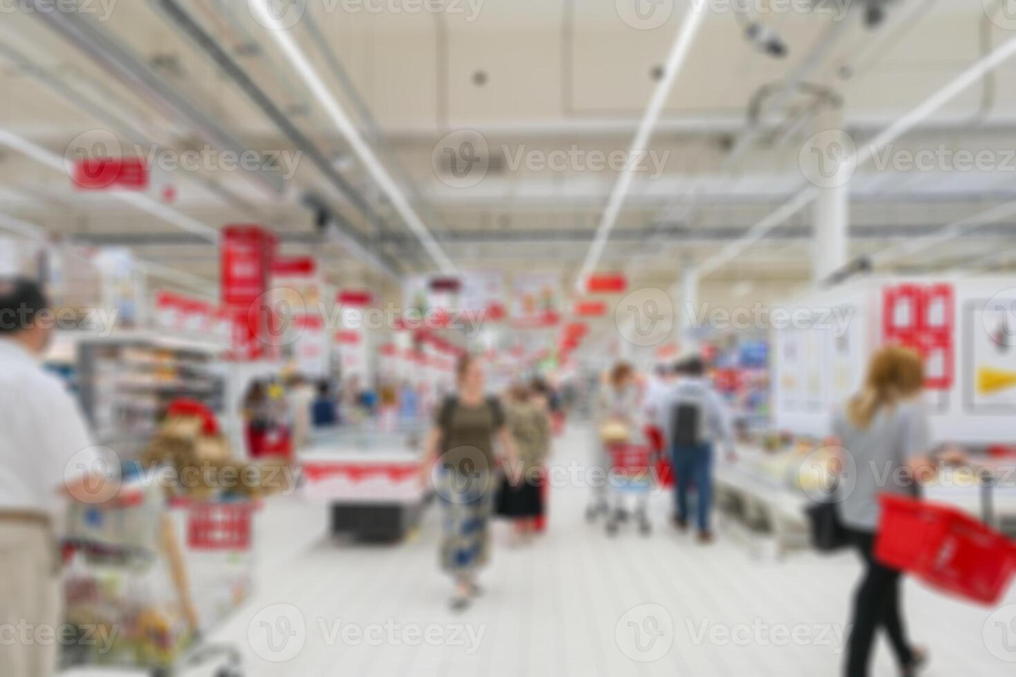 Interior supermarket products. Buyers on the trading floor. Soft focus background. photo
