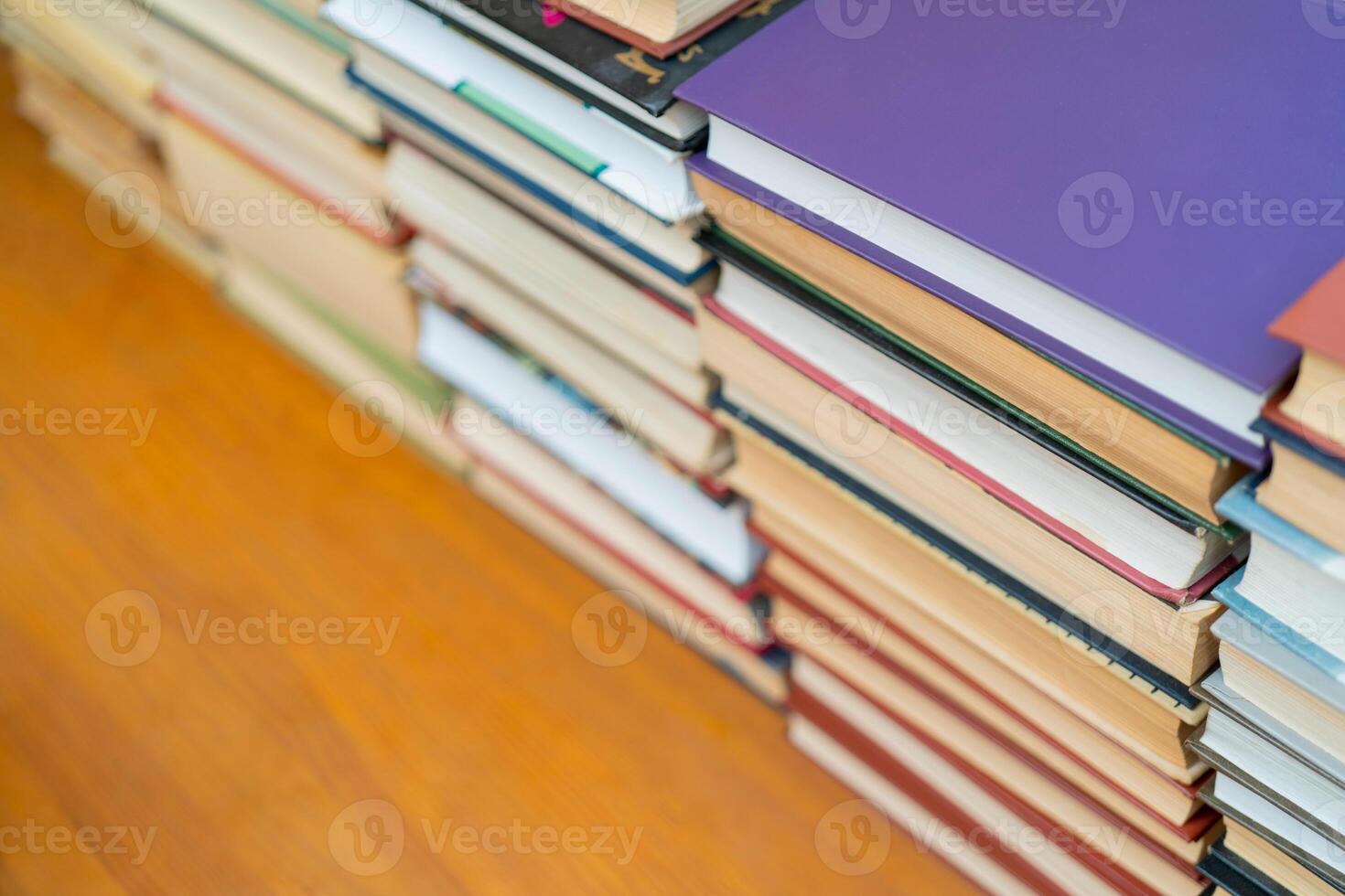 Rows of books in the library. Background for text. Symbol of knowledge and learning. photo