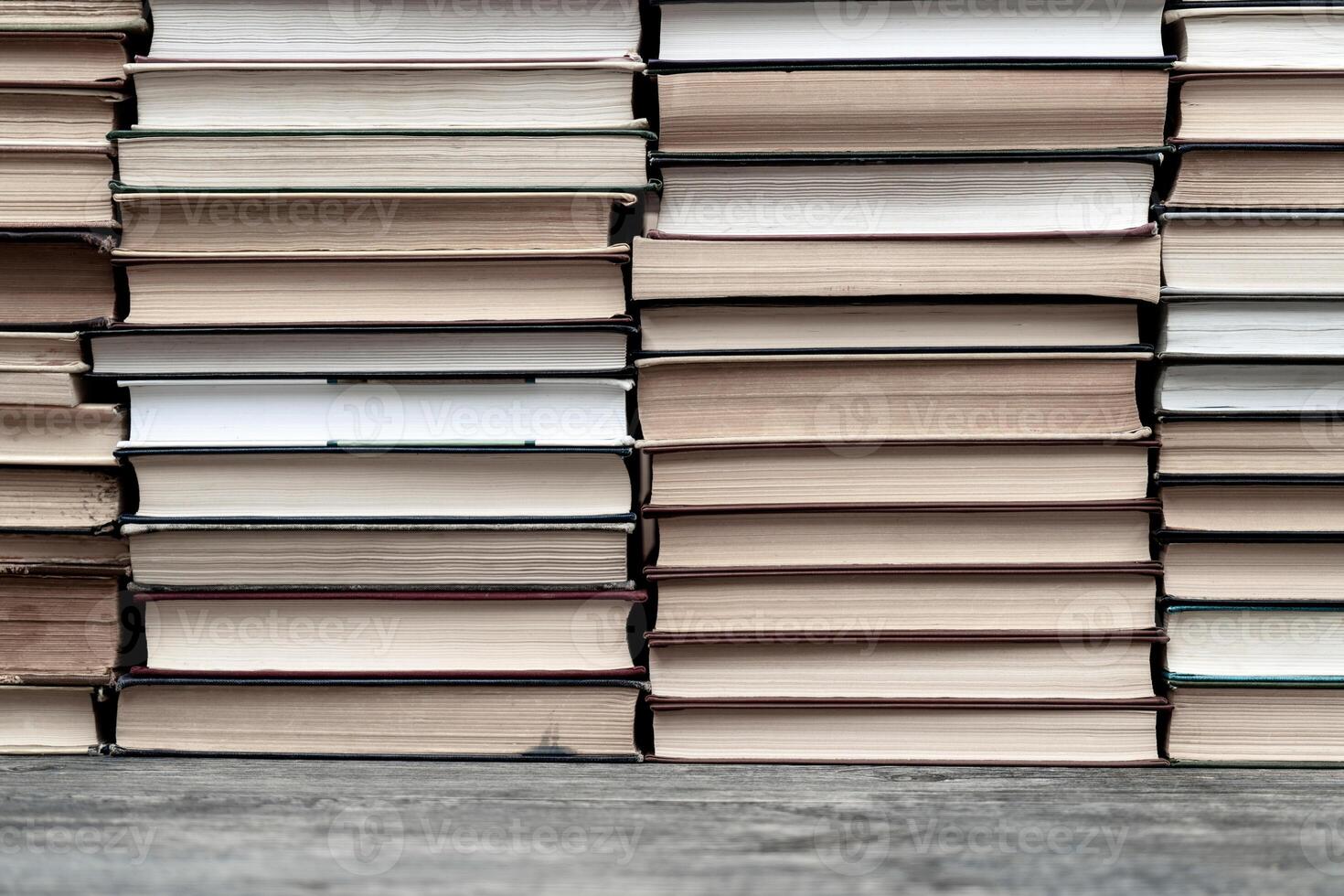 Rows of books in the library. Background for text. Symbol of knowledge and learning. photo