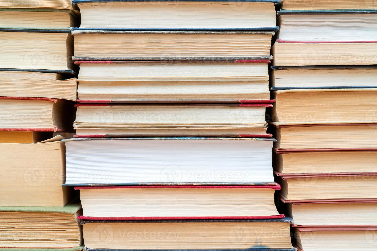 Rows of books in the library. Background for text. Symbol of knowledge and learning. photo