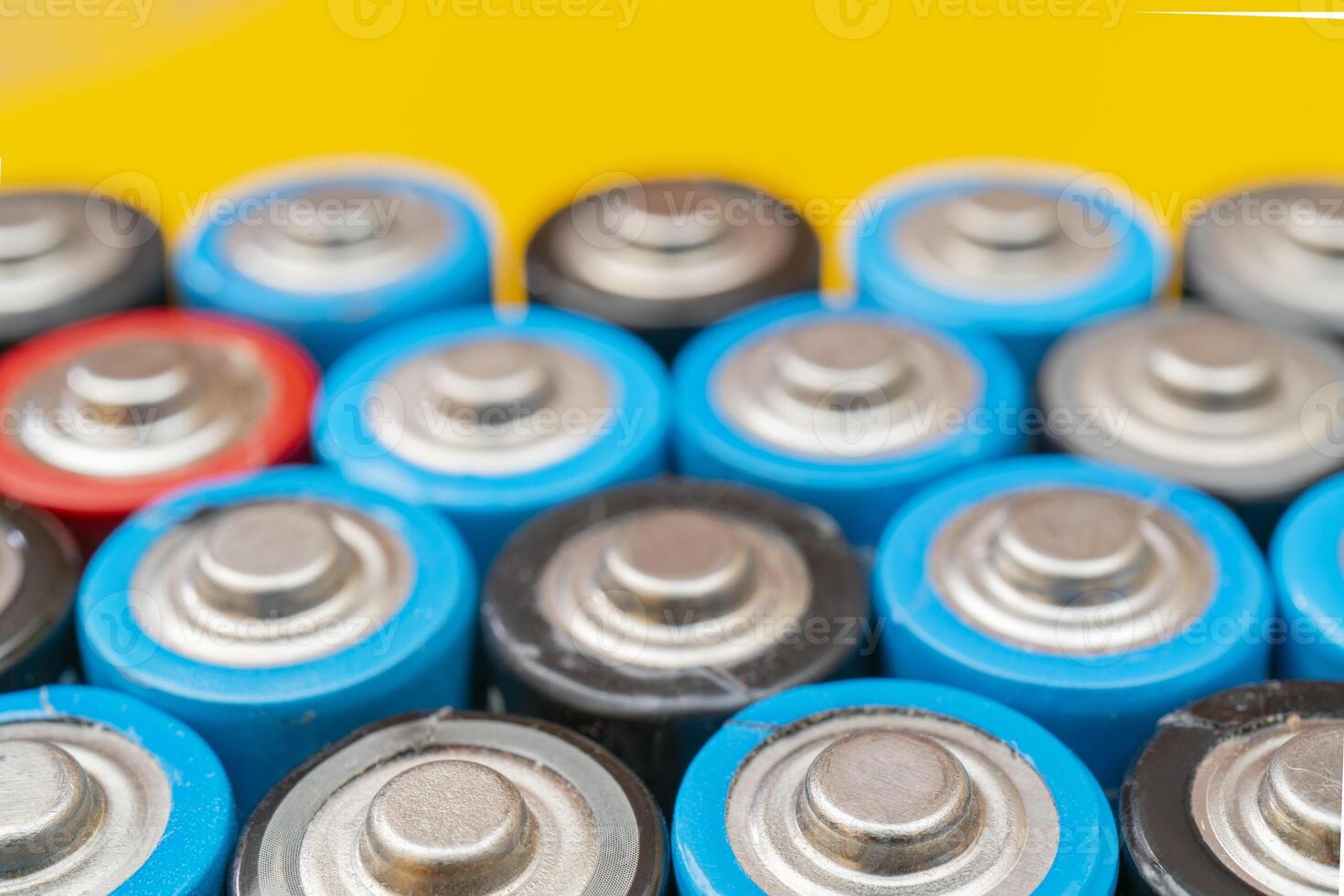 Used batteries. Waste collection and recycling. Environmental Protection. Batteries background. photo