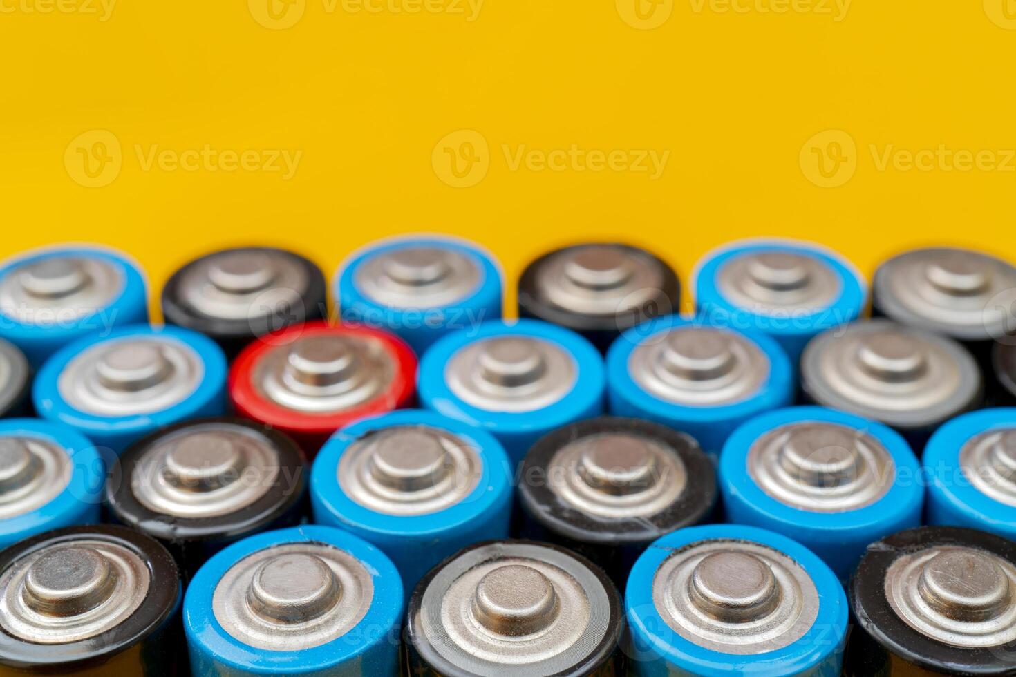 Used batteries. Waste collection and recycling. Environmental Protection. Batteries background. photo