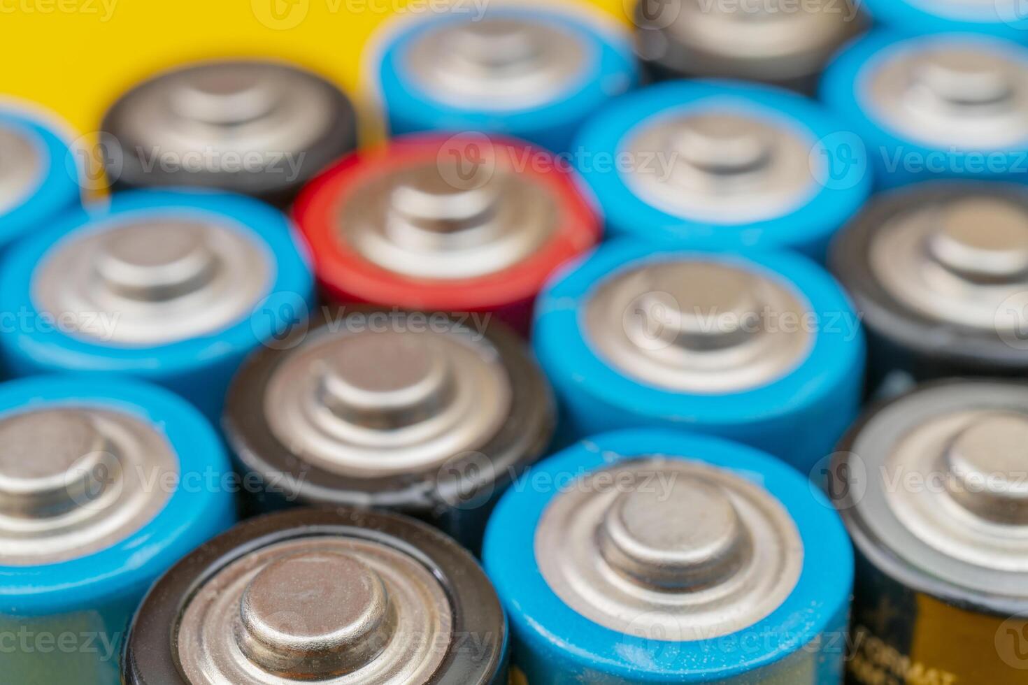 Used batteries. Waste collection and recycling. Environmental Protection. Batteries background. photo