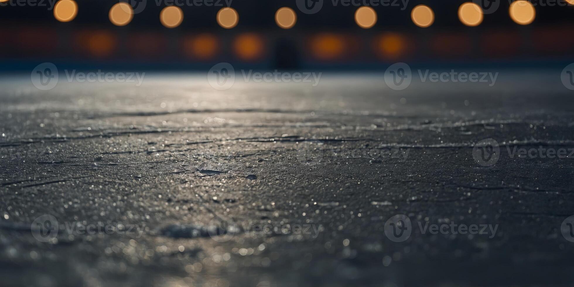 A close-up of a hockey puck with skate marks etched into its surface. photo