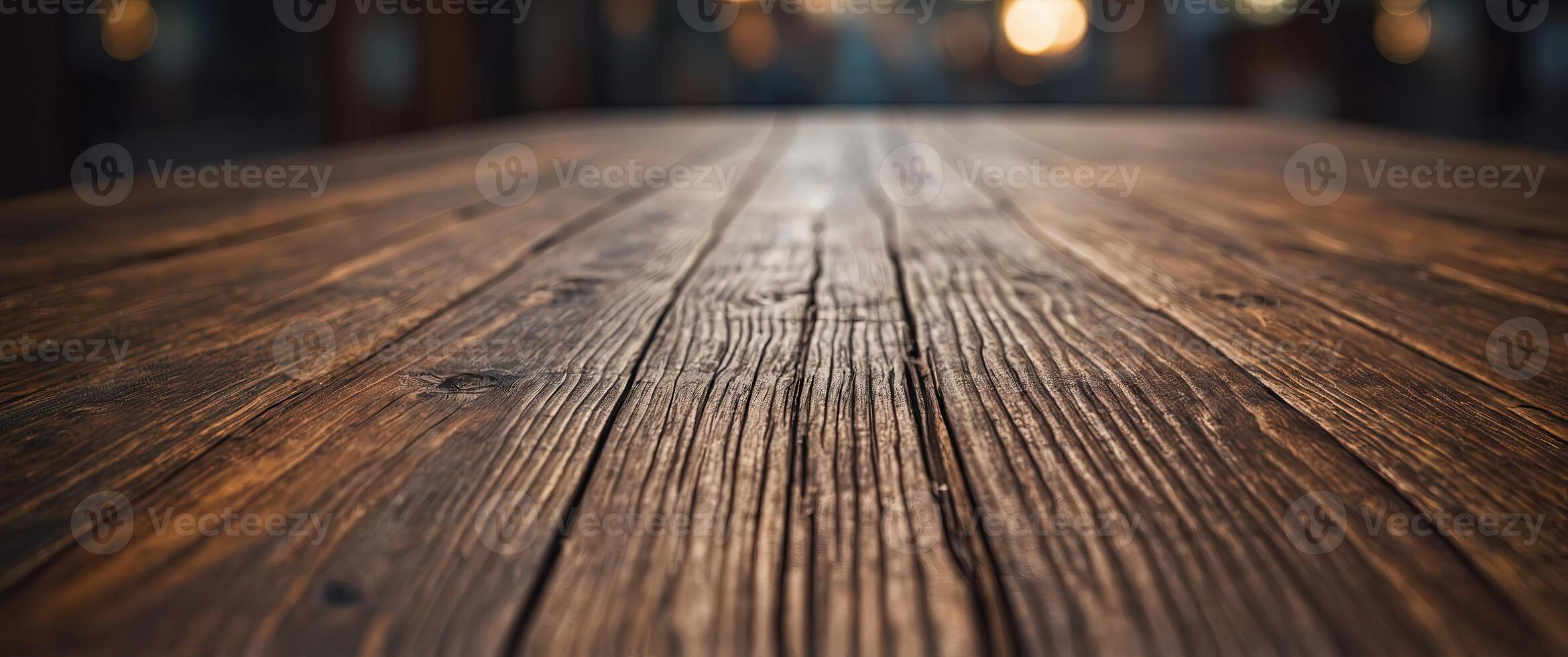 An empty brown wooden table with a blur background. photo