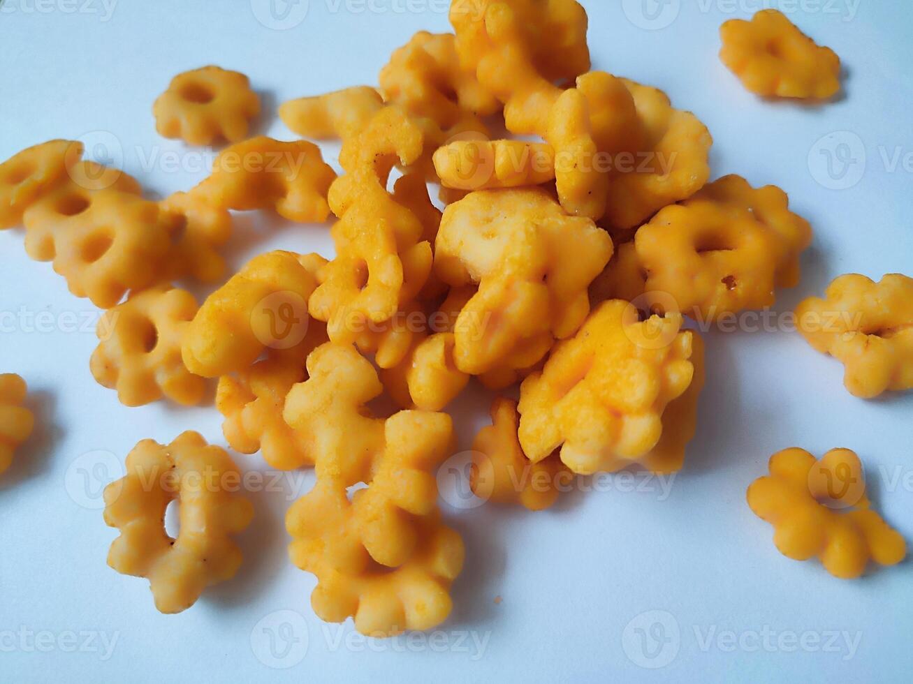 Sakura ribut, the fried dough is shaped like a flower, it tastes delicious. Snacks from Indonesia isolated on white background photo