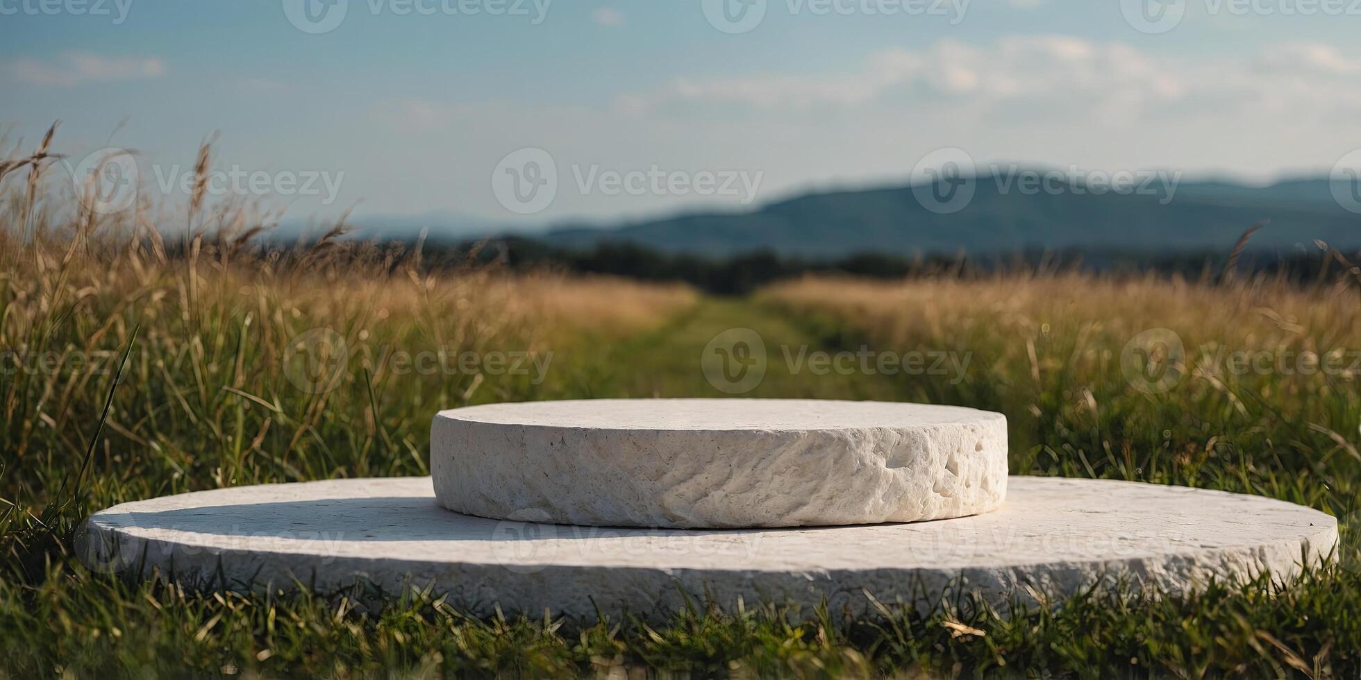 White stone podium surrounded by grass Minimal scene podium for product presentation or advertising. photo