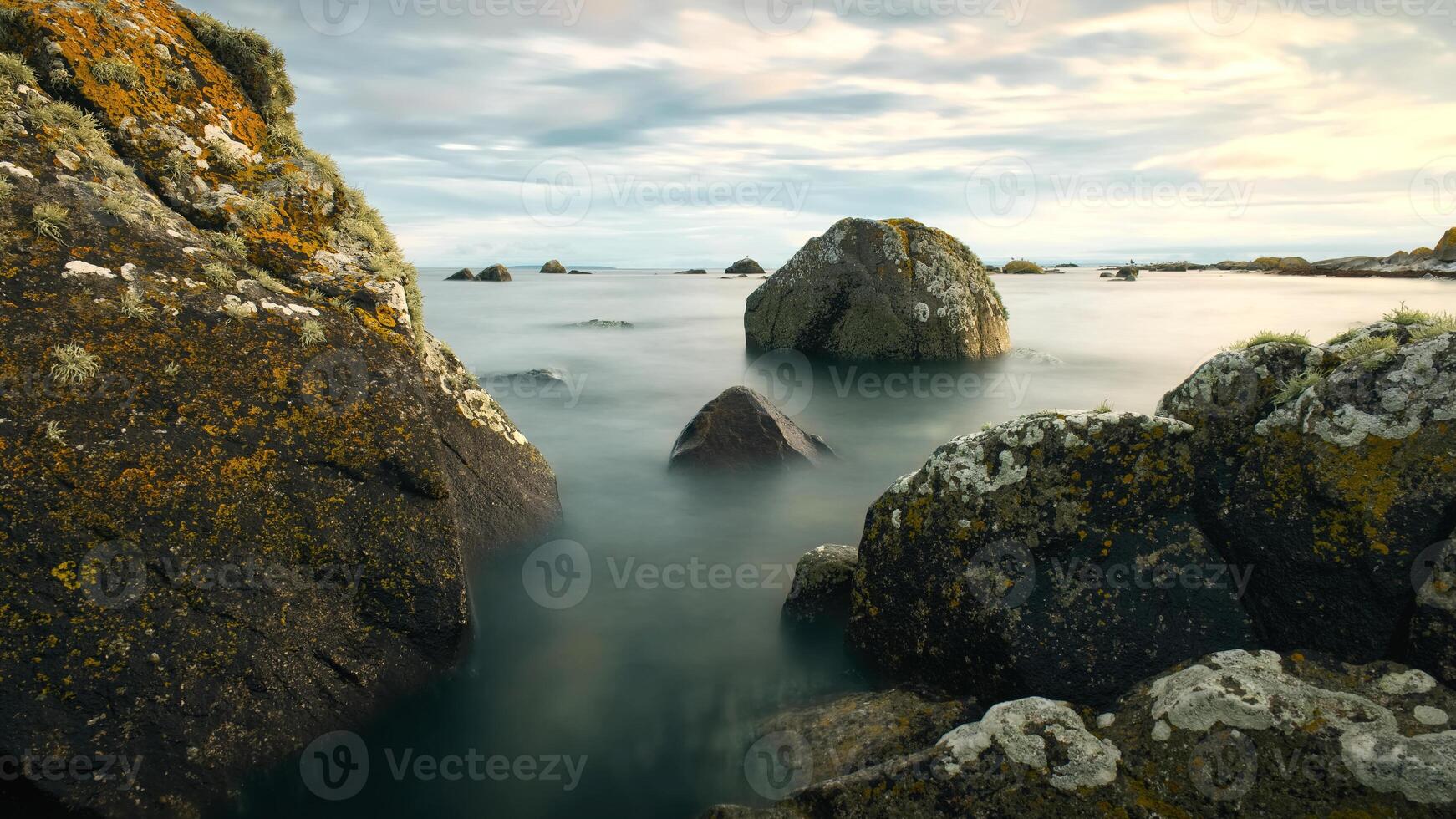 Beautiful coastal landscape scenery, rocky coast of wild Atlantic way at sunset, nature background, wallpaper, long exposure photo