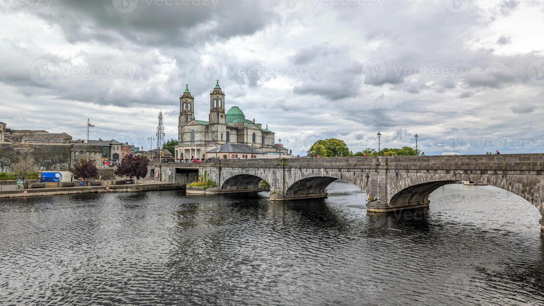 Beautiful old cityscape scenery, Church of Saints Peter and Paul by Shannon river at Athlone, town in Westmeath, Ireland, landmark and architecture background photo