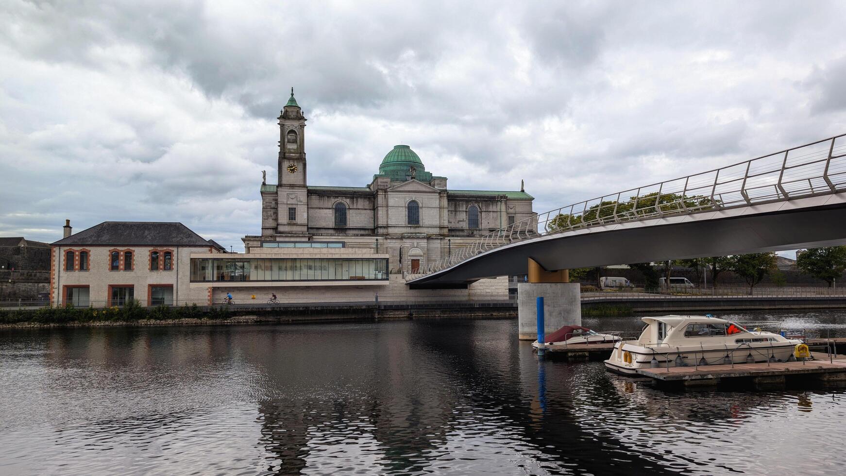 Beautiful old cityscape scenery, Church of Saints Peter and Paul by Shannon river at Athlone, town in Westmeath, Ireland, landmark and architecture background photo